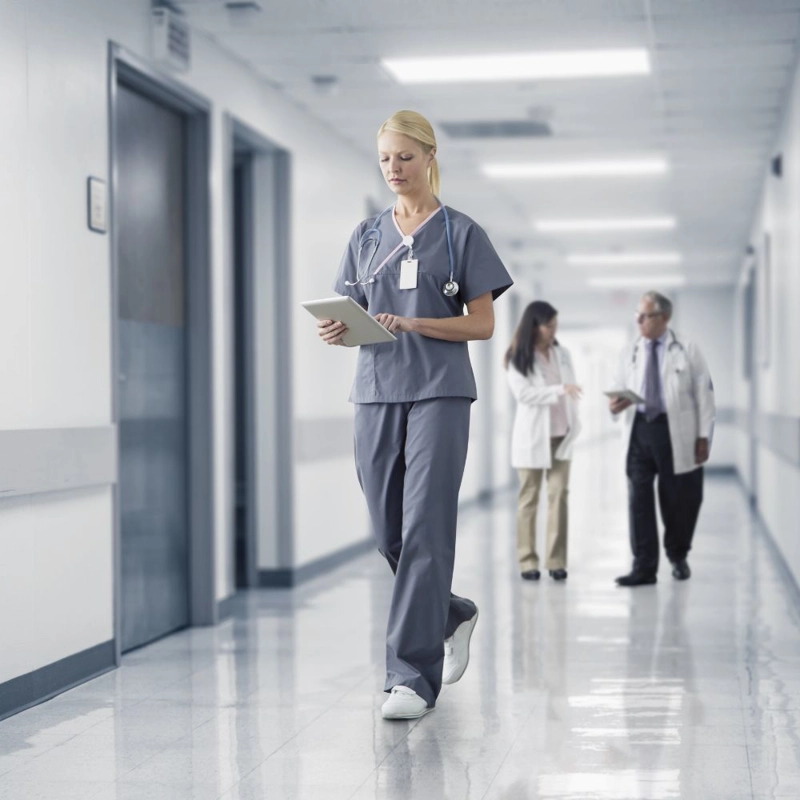 Healthcare workers walking in hallway
